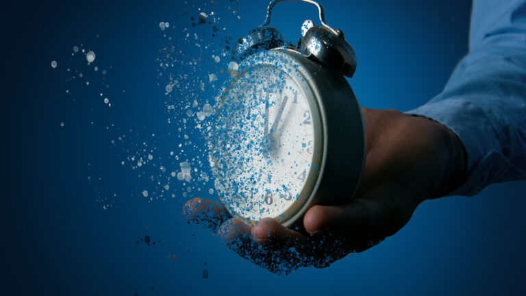 Workspace setup with planner or laptop representing time management techniques for entrepreneurs.